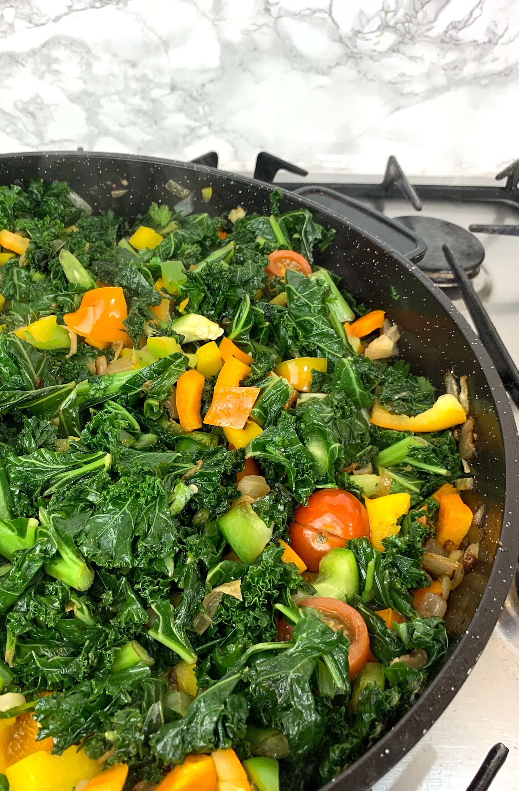 Healthy Stir-fried  Kale with peppers and tomatoes 